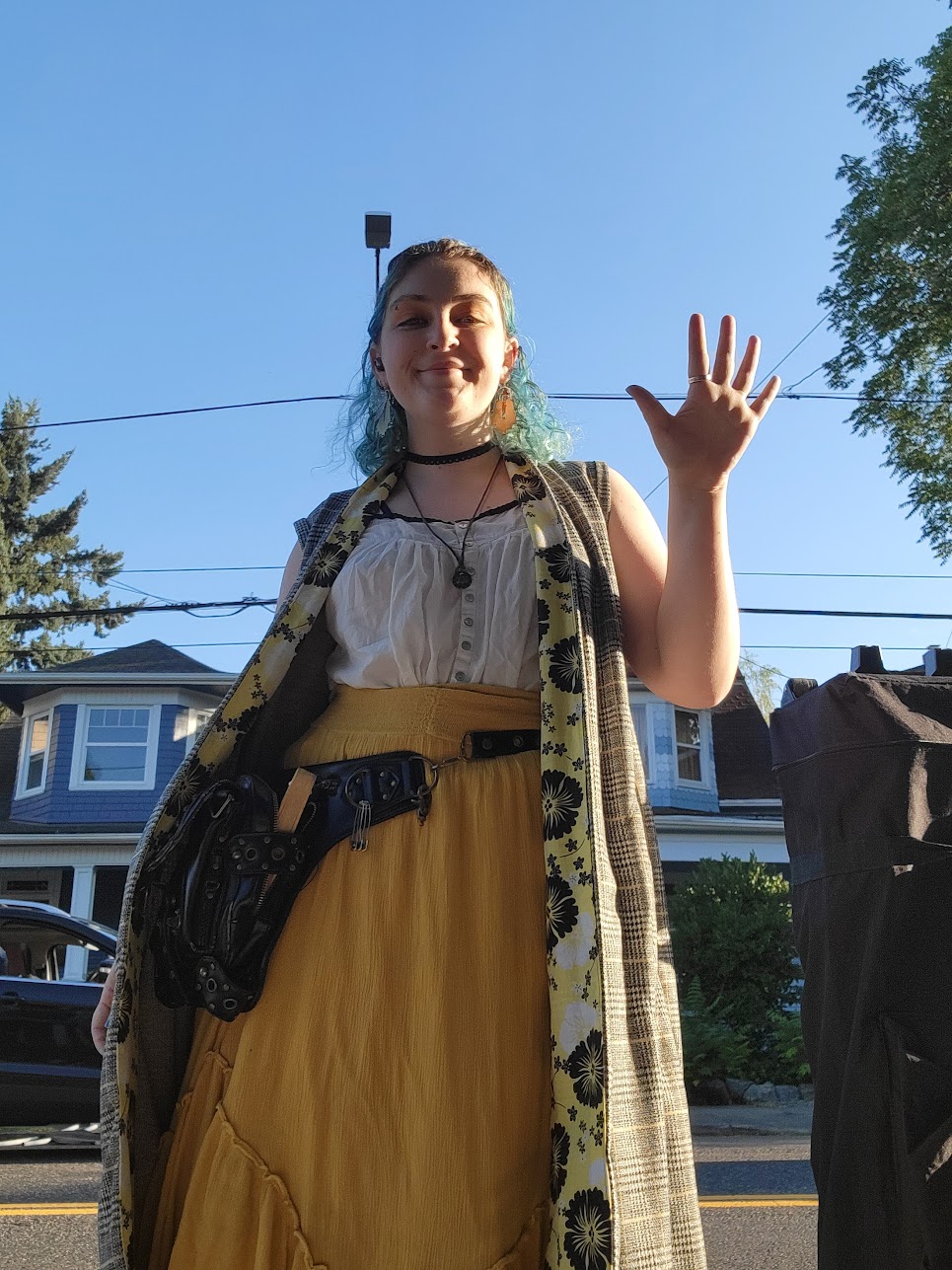 someone wearing a calf length vest