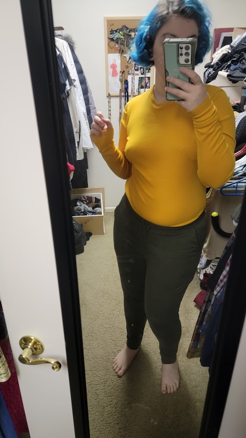 someone wearing a yellow bodysuit.