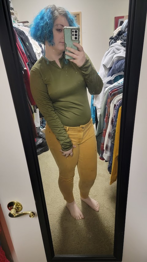 someone wearing a green bodysuit.